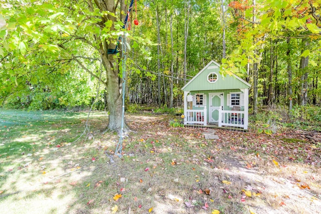 3694 Kerlikowske Rd, Coloma, MI 49038 - view of outbuilding featuring an outbuilding and a forest view