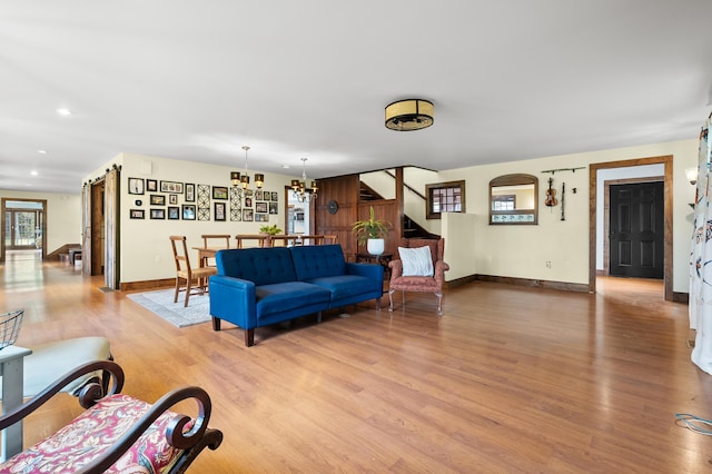 3694 Kerlikowske Rd, Coloma, MI 49038 - living area with light wood-type flooring, stairs, a chandelier, baseboards, and recessed lighting