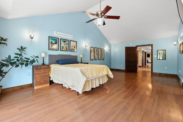 3694 Kerlikowske Rd, Coloma, MI 49038 - bedroom featuring high vaulted ceiling, wood finished floors, baseboards, and a ceiling fan