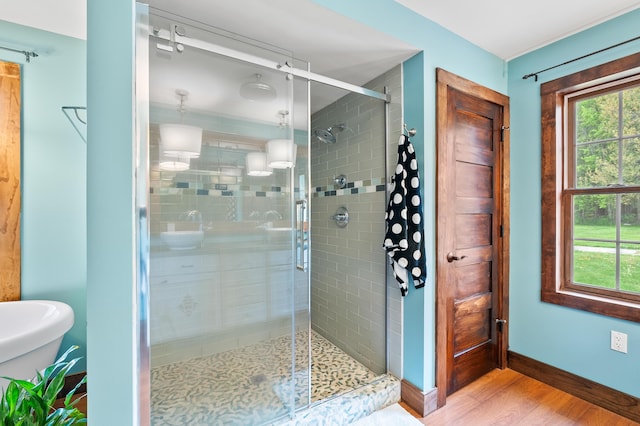 3694 Kerlikowske Rd, Coloma, MI 49038 - bathroom with wood finished floors, baseboards, and a shower stall