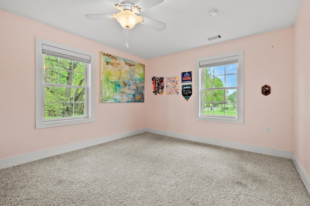 3694 Kerlikowske Rd, Coloma, MI 49038 - carpeted spare room featuring baseboards, a smoke detector, and a ceiling fan