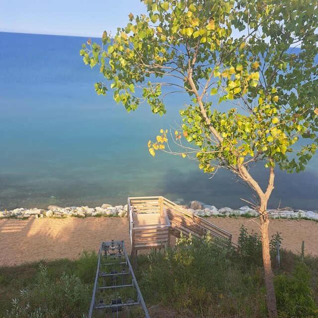 7251 E Beach Dr, South Haven, MI 49090 - water view with a boat dock