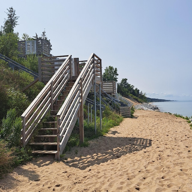 7251 E Beach Dr, South Haven, MI 49090 - view of community featuring a water view and stairs