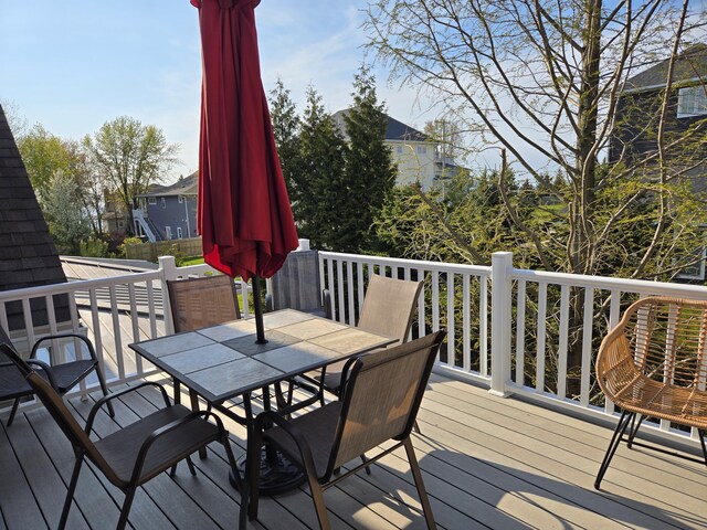 7251 E Beach Dr, South Haven, MI 49090 - deck with outdoor dining area