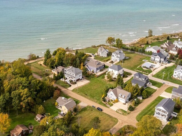 7251 E Beach Dr, South Haven, MI 49090 - aerial view of property's location with nearby suburban area and waterfront with a beach