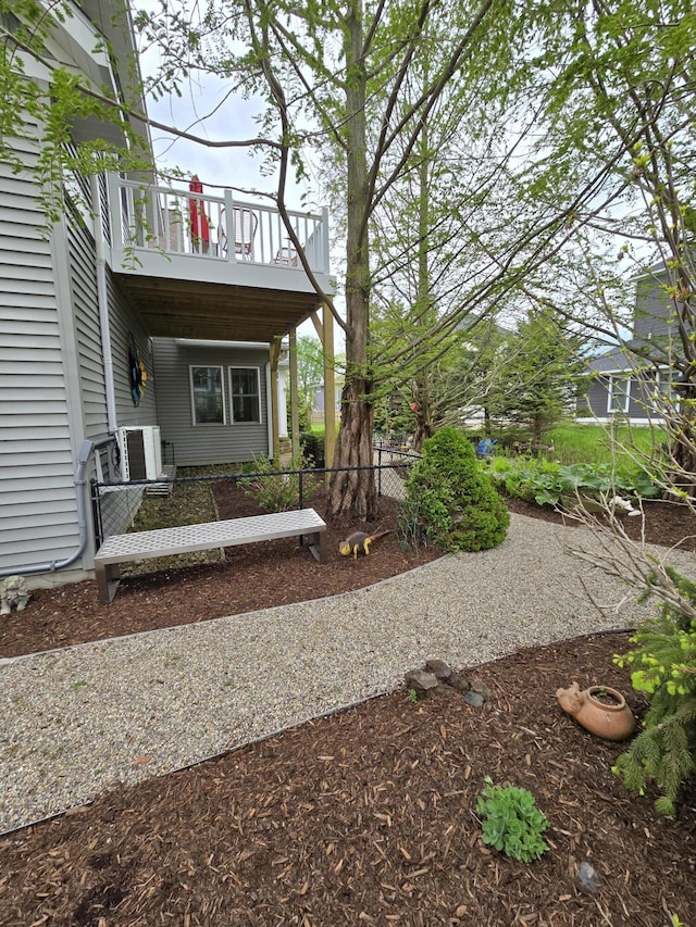 7251 E Beach Dr, South Haven, MI 49090 - view of yard with a balcony