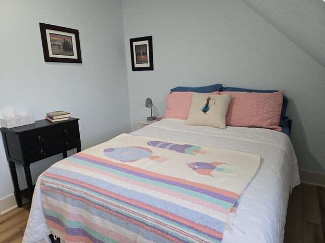 7251 E Beach Dr, South Haven, MI 49090 - bedroom with wood finished floors and baseboards