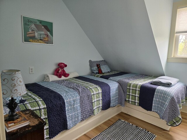 7251 E Beach Dr, South Haven, MI 49090 - bedroom featuring wood finished floors