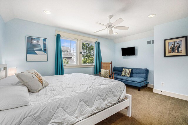 7251 E Beach Dr, South Haven, MI 49090 - carpeted bedroom with vaulted ceiling, ceiling fan, baseboards, and recessed lighting