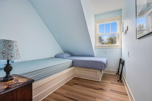 7251 E Beach Dr, South Haven, MI 49090 - bedroom with wood finished floors and baseboards