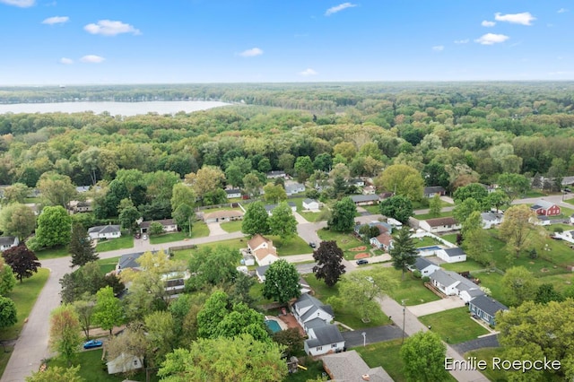 8131 Lorac St, Portage, MI 49002 - aerial perspective of suburban area featuring a large body of water and a forest