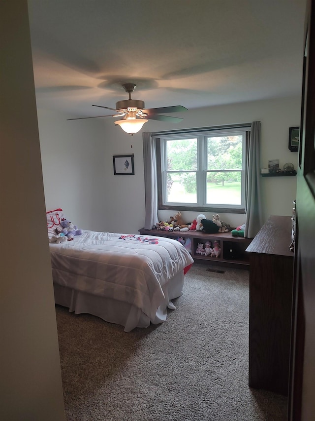 bedroom with carpet floors and ceiling fan