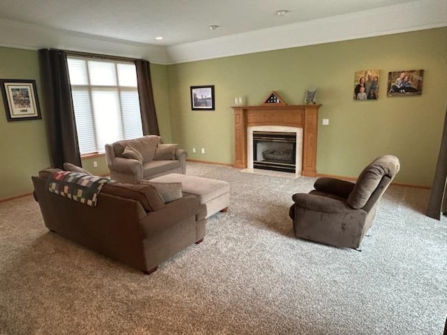 carpeted living area featuring ornamental molding, a fireplace with flush hearth, and baseboards