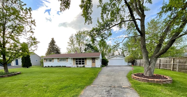 5817 Everest Dr, Clarkston, MI 48346 - ranch-style home featuring a detached garage and an outdoor structure
