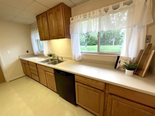 5817 Everest Dr, Clarkston, MI 48346 - kitchen featuring a sink, black dishwasher, a drop ceiling, brown cabinets, and light countertops