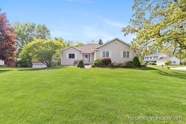 view of front of home with a front lawn
