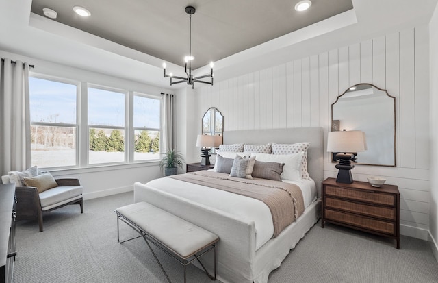 50024 Bluebell St, Canton, MI 48188 - carpeted bedroom with a tray ceiling, baseboards, recessed lighting, and a chandelier
