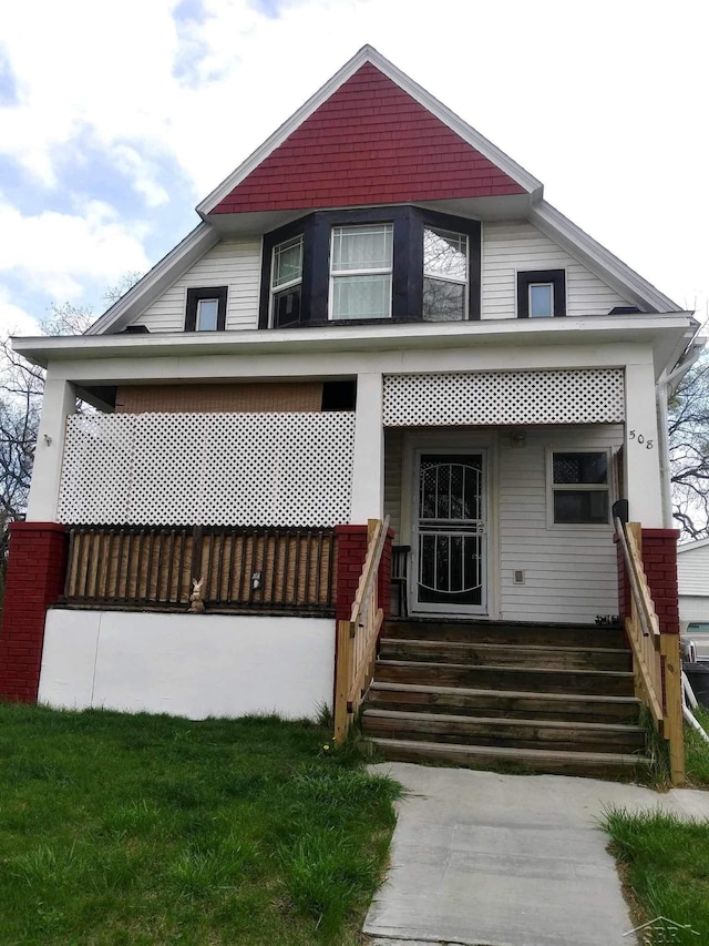 508 N Roosevelt Austin Ave, Saginaw, MI 48607 - view of front facade featuring a porch