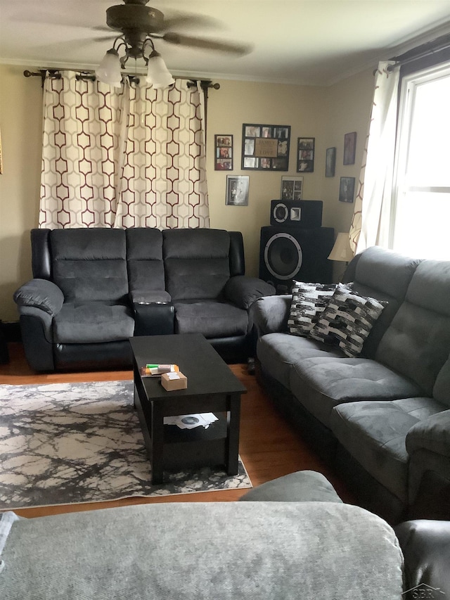 508 N Roosevelt Austin Ave, Saginaw, MI 48607 - living room featuring a ceiling fan, ornamental molding, and wood finished floors