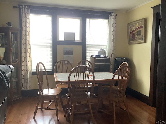 508 N Roosevelt Austin Ave, Saginaw, MI 48607 - dining room featuring crown molding and hardwood / wood-style flooring