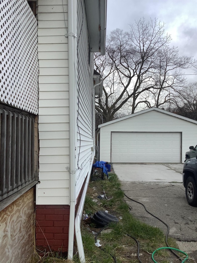 508 N Roosevelt Austin Ave, Saginaw, MI 48607 - view of property exterior with an outdoor structure, a garage, and fence