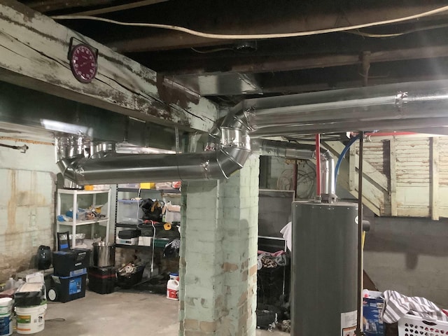 508 N Roosevelt Austin Ave, Saginaw, MI 48607 - unfinished basement featuring gas water heater