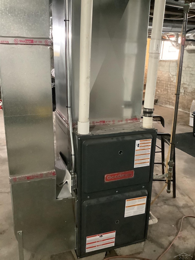 508 N Roosevelt Austin Ave, Saginaw, MI 48607 - utility room with heating unit