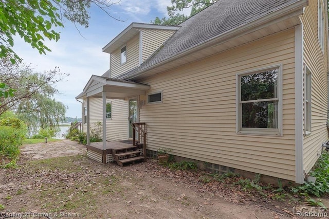 117 Studer Dr, Grass Lake, MI 49240 - back of house featuring a shingled roof