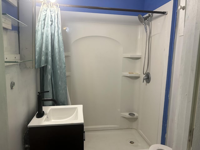172 Goguac St W, Battle Creek, MI 49015 - bathroom with a shower stall and vanity