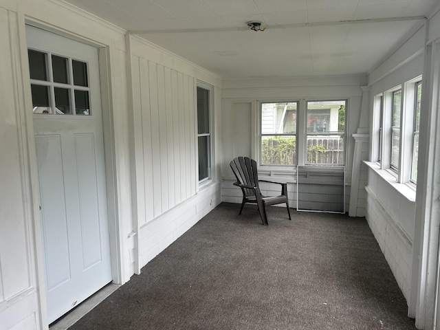 172 Goguac St W, Battle Creek, MI 49015 - sunroom / solarium featuring carpet floors and crown molding