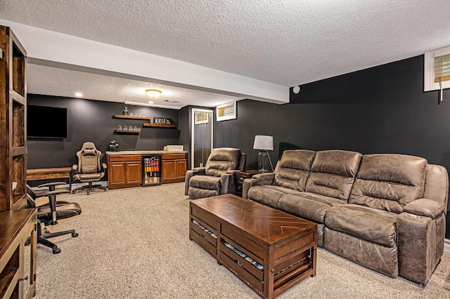 living room with light colored carpet, a textured ceiling, a dry bar, and beverage cooler