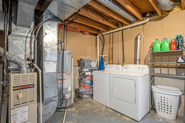 unfinished below grade area with water heater and separate washer and dryer