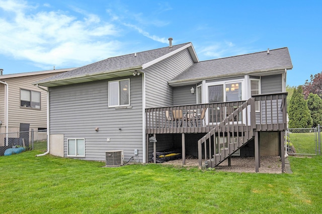 back of house featuring a deck, stairs, roof with shingles, and central AC