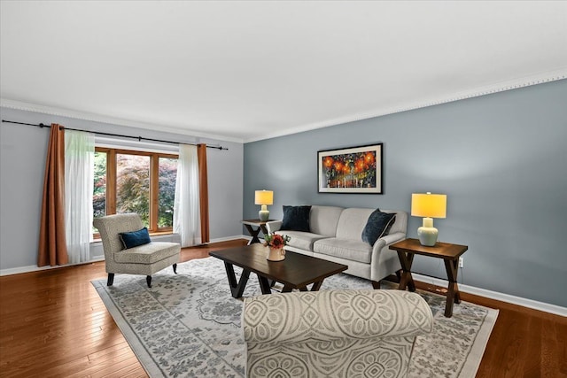 6588 White Pines Dr, Brighton, MI 48116 - living area with crown molding, baseboards, and wood finished floors