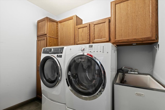 6588 White Pines Dr, Brighton, MI 48116 - washroom with cabinet space, independent washer and dryer, and tile patterned floors