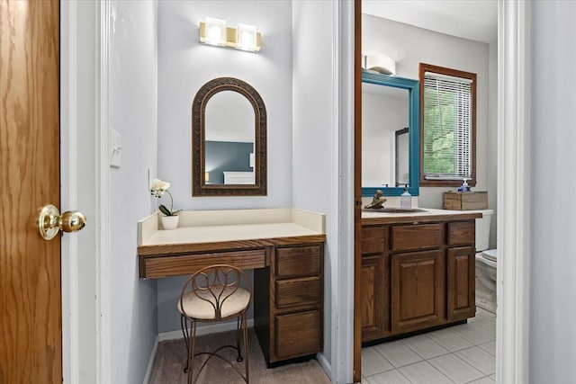 6588 White Pines Dr, Brighton, MI 48116 - bathroom featuring vanity, toilet, and tile patterned flooring
