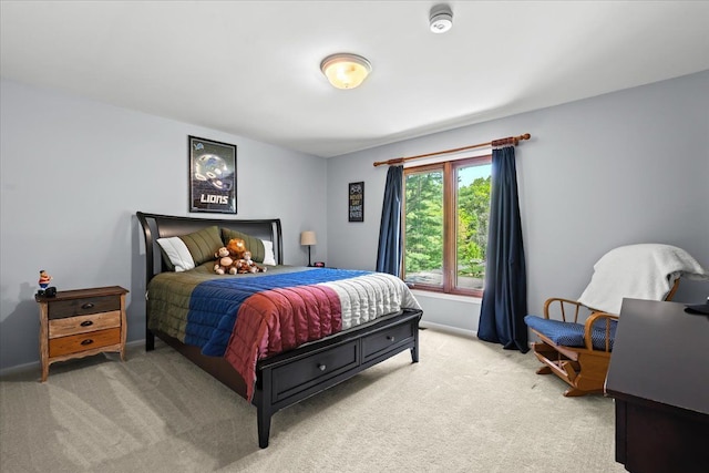 6588 White Pines Dr, Brighton, MI 48116 - bedroom with light carpet and baseboards