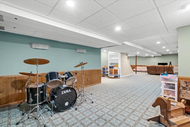 6588 White Pines Dr, Brighton, MI 48116 - playroom with carpet flooring, a wainscoted wall, and wooden walls