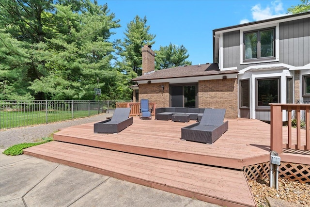 6588 White Pines Dr, Brighton, MI 48116 - wooden terrace featuring an outdoor living space and fence