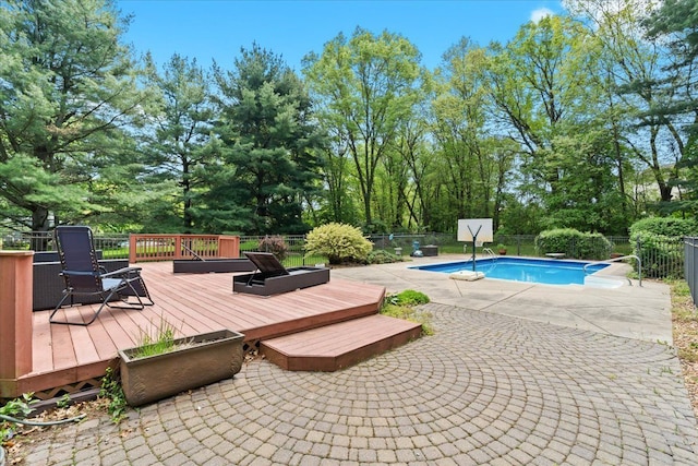 6588 White Pines Dr, Brighton, MI 48116 - view of pool featuring fence, a wooden deck, a diving board, and a patio