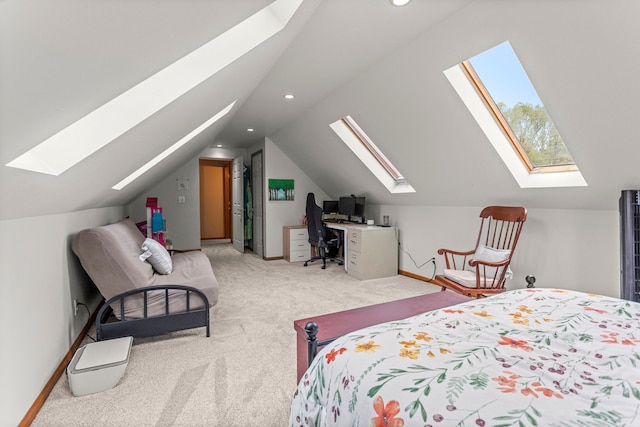 carpeted bedroom with a skylight, vaulted ceiling, an office area, recessed lighting, and baseboards