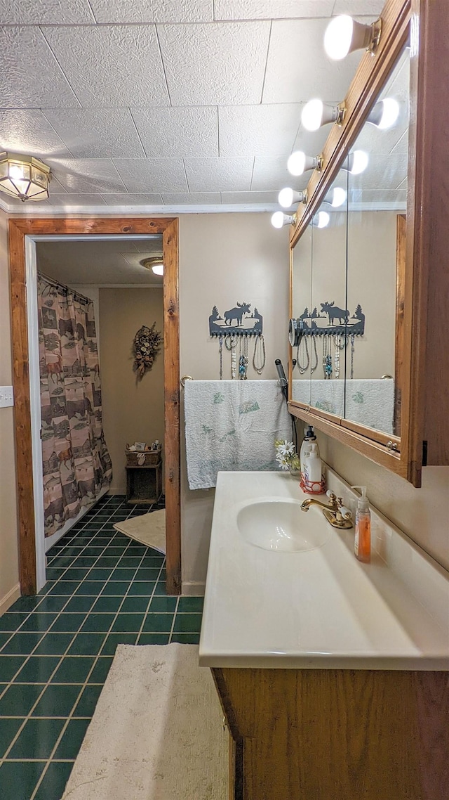 7884 N Saint Helen Rd, Saint Helen, MI 48656 - bathroom with vanity, tile patterned floors, and baseboards