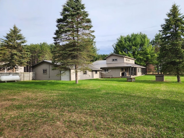 7884 N Saint Helen Rd, Saint Helen, MI 48656 - view of yard with a sunroom