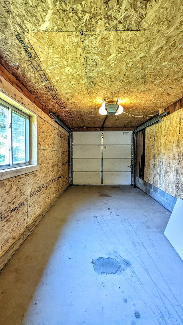 7884 N Saint Helen Rd, Saint Helen, MI 48656 - garage with a garage door opener