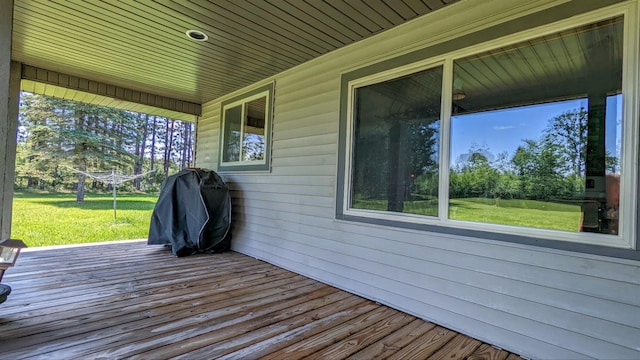 7884 N Saint Helen Rd, Saint Helen, MI 48656 - wooden deck featuring a yard and grilling area