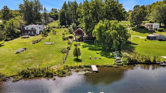 6520 Oakwood Dr, Delton, MI 49046 - view of subject property featuring a nearby body of water and a tree filled landscape