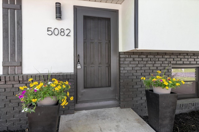 5082 Patland Dr, Kalamazoo, MI 49009 - entrance to property with stucco siding