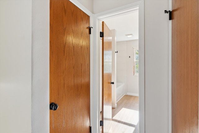5082 Patland Dr, Kalamazoo, MI 49009 - hallway with wood finished floors