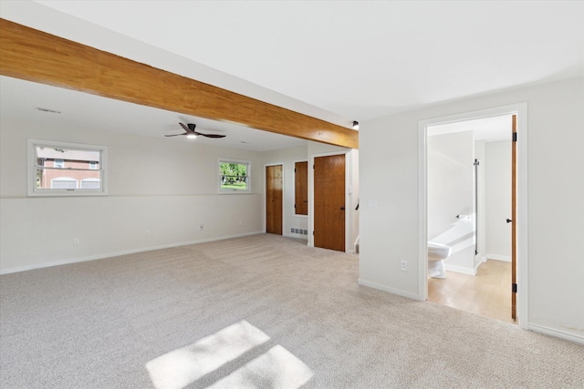 5082 Patland Dr, Kalamazoo, MI 49009 - spare room featuring light carpet, baseboards, and ceiling fan