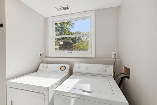 5082 Patland Dr, Kalamazoo, MI 49009 - clothes washing area with independent washer and dryer